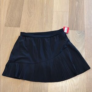 SPANX Black Mini Skirt with Pleats. Medium. New with tags.